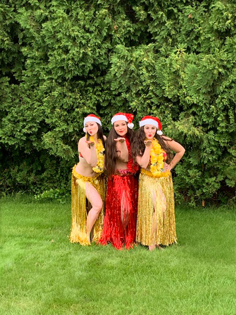 Hula dancers with Santa hats